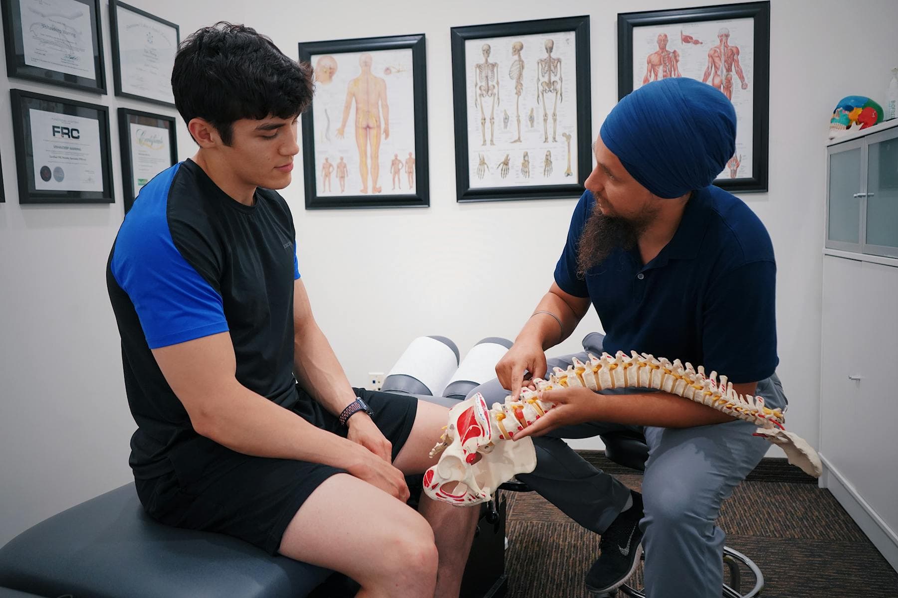 Stock photo representing spine care consultation.